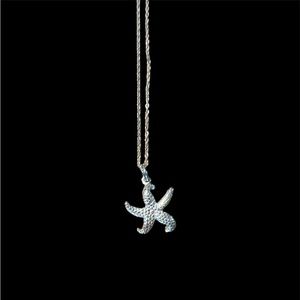 Necklace with starfish pendant